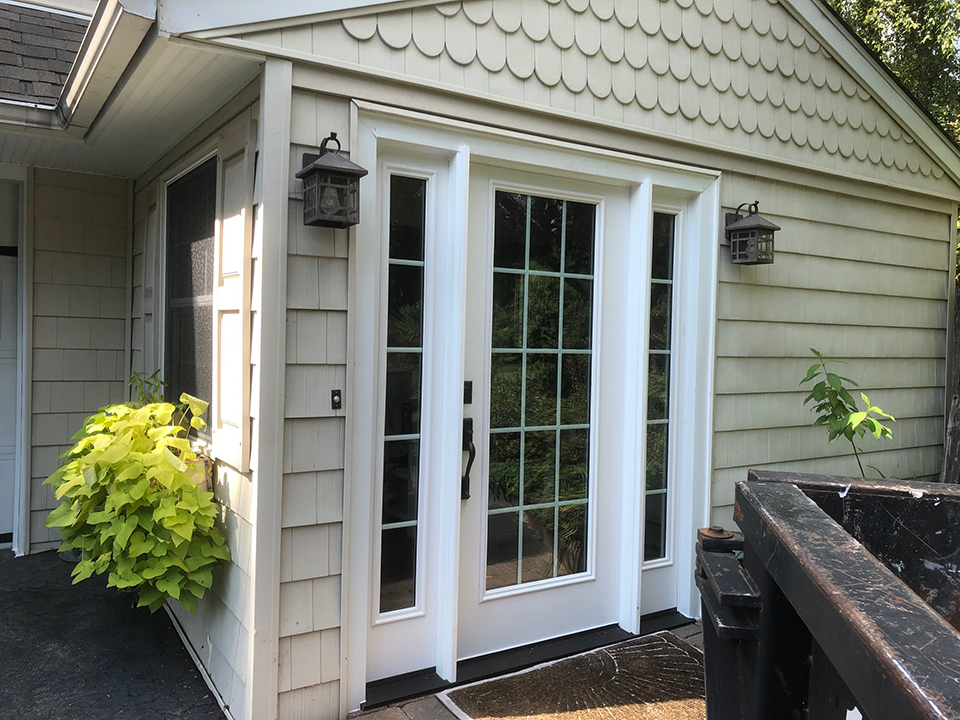 Upgraded doors and windows by Precision Contracting, LLC